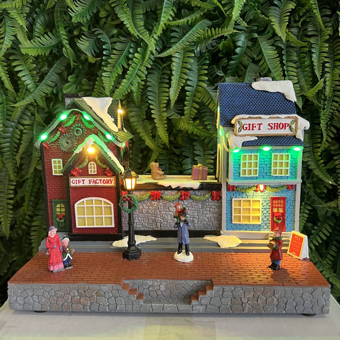 Christmas resin craft ornaments Christmas gift factory with LED light and transport belt gift rotation function