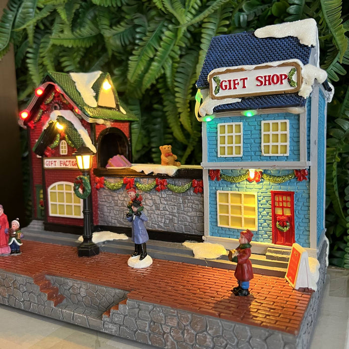 Christmas resin craft ornaments Christmas gift factory with LED light and transport belt gift rotation function