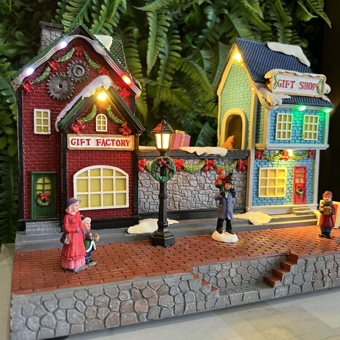 Christmas resin craft ornaments Christmas gift factory with LED light and transport belt gift rotation function