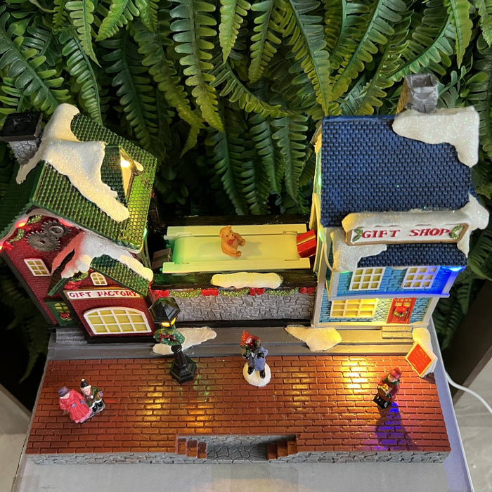 Christmas resin craft ornaments Christmas gift factory with LED light and transport belt gift rotation function