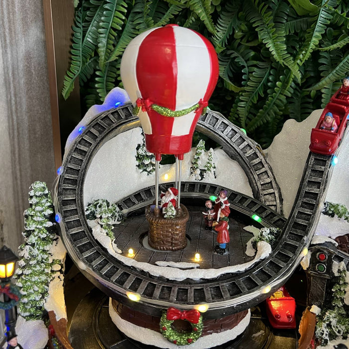Christmas resin craft ornaments Christmas playground with LED lights, carousel, hot air balloon, roller coaster and Christmas tree spinning features