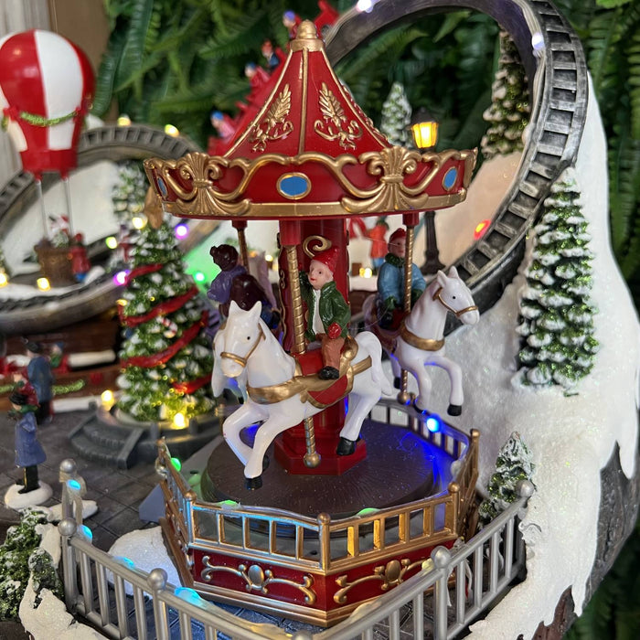 Christmas resin craft ornaments Christmas playground with LED lights, carousel, hot air balloon, roller coaster and Christmas tree spinning features