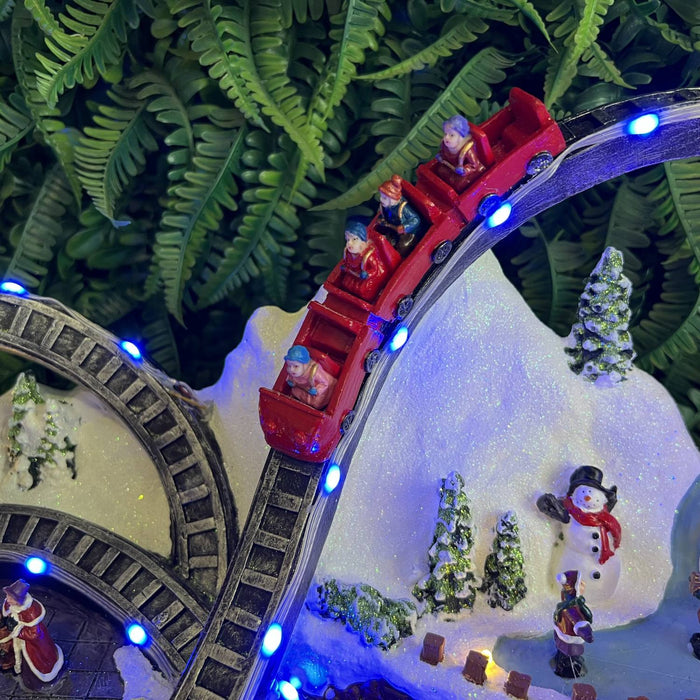 Christmas resin craft ornaments Christmas playground with LED lights, carousel, hot air balloon, roller coaster and Christmas tree spinning features